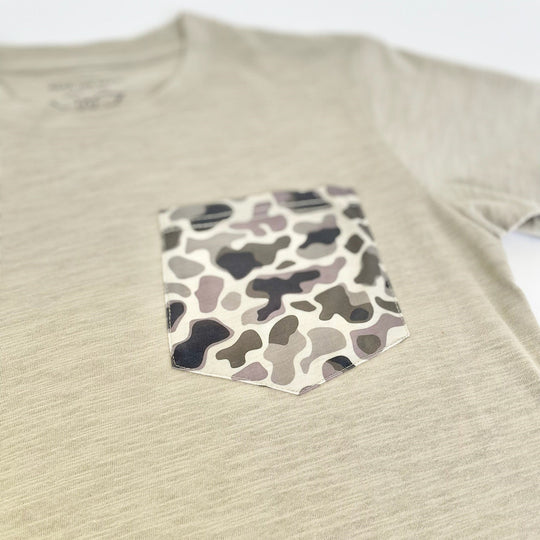 Beige shirt with a camouflage pocket on a white background