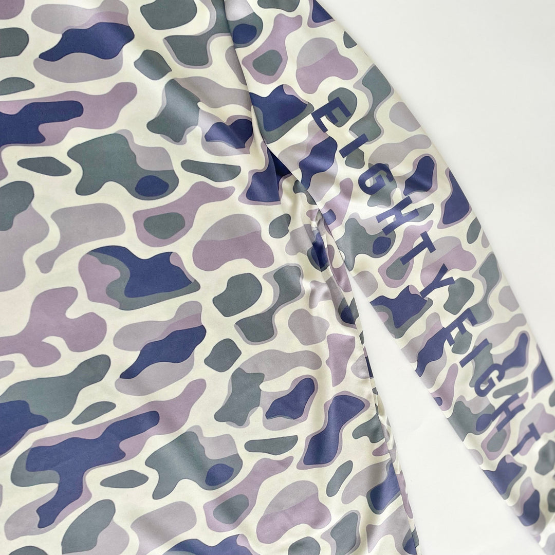 Camouflage-patterned fabric with &
