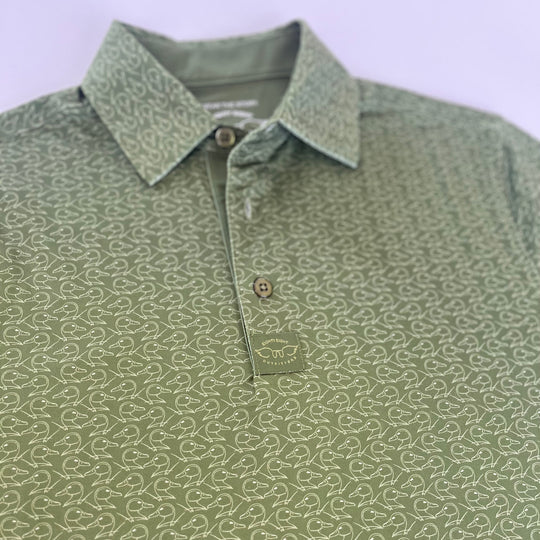 green youth polo with duck pattern on white background