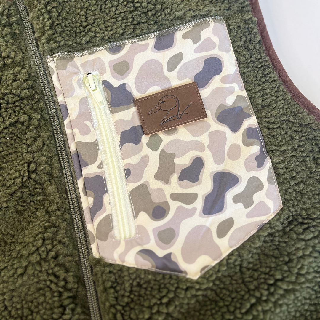 green fleece/sherpa vest with camo pocket
