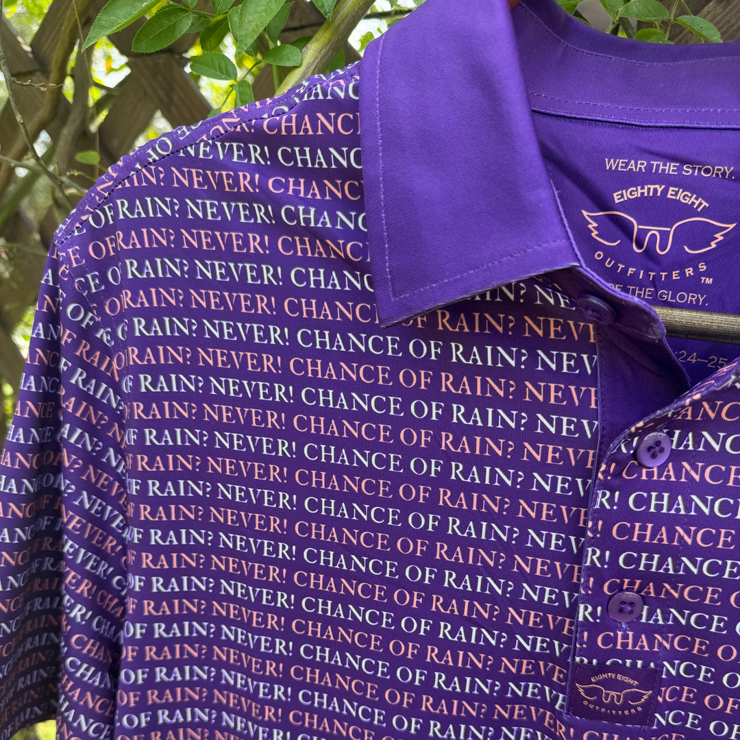 A close-up of a purple short-sleeve polo shirt with an all-over repeating text pattern reading &