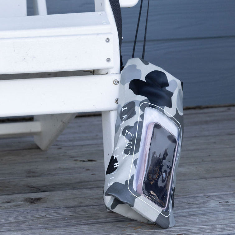 camo dry bag hanging on chair