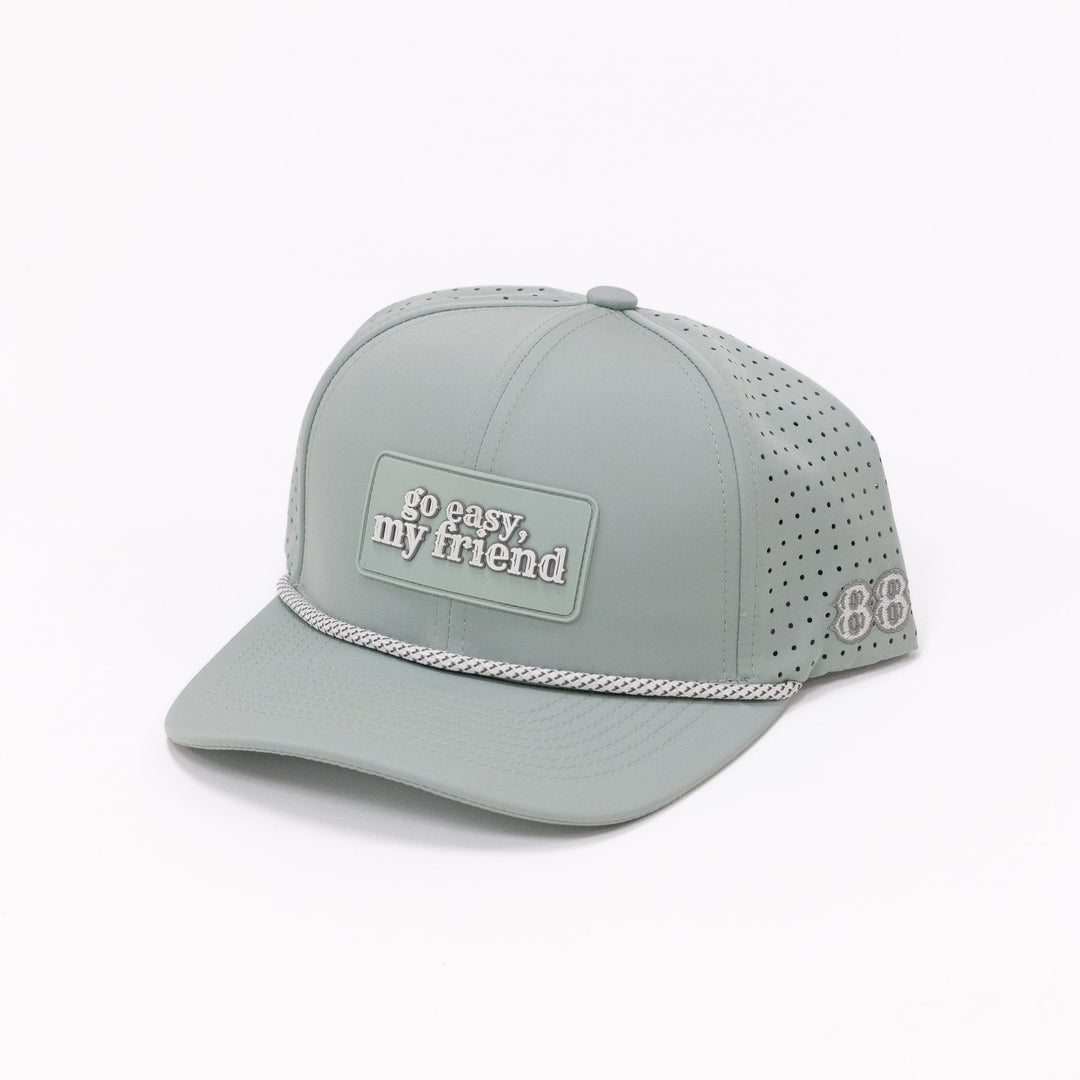Light green cap with text on a white background