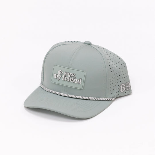 Light green cap with text on a white background